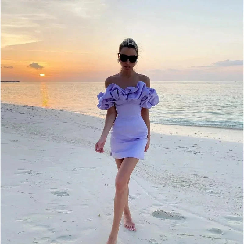 Purple satin mini dress by Lumina Vancouver featuring off-shoulder design and fitted silhouette.