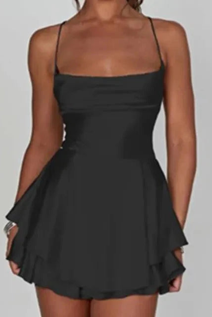 Green satin mini dress with cowl neck by Lumina Wear, featuring a sleek, fitted silhouette perfect for elegant occasions.