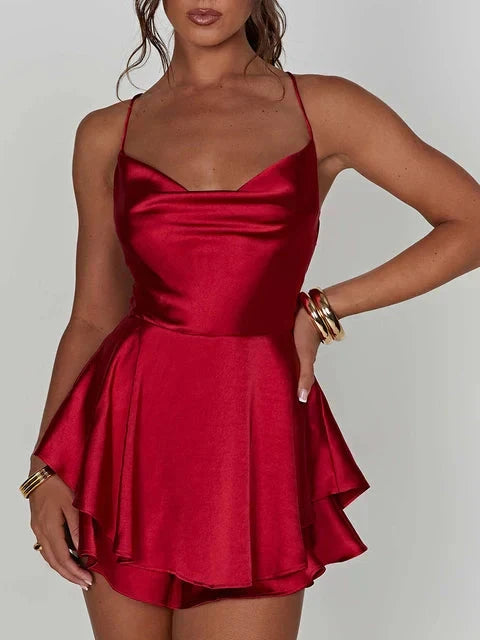 Green satin mini dress with cowl neck by Lumina Vancouver, featuring a sleek, stylish silhouette perfect for elegant occasions.