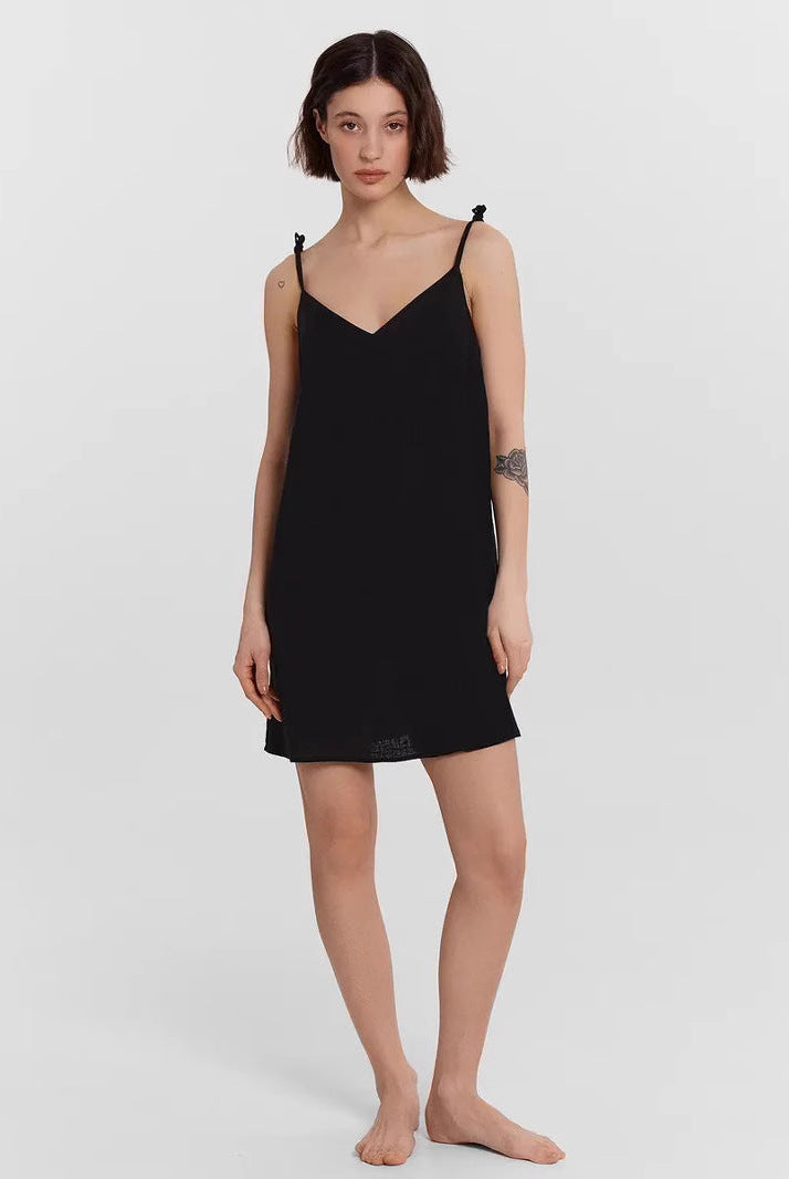 Black Carys satin slip dress by Lumina Wear, mini dress style, featuring smooth satin fabric and elegant fit.