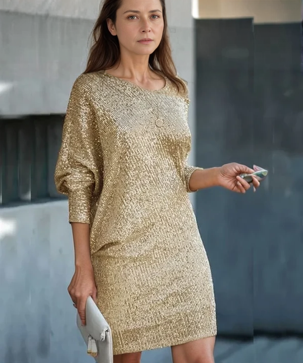 Black Olwen sequin mini dress with round neckline by Lumina Vancouver, featuring shimmering sequins and a fitted silhouette.