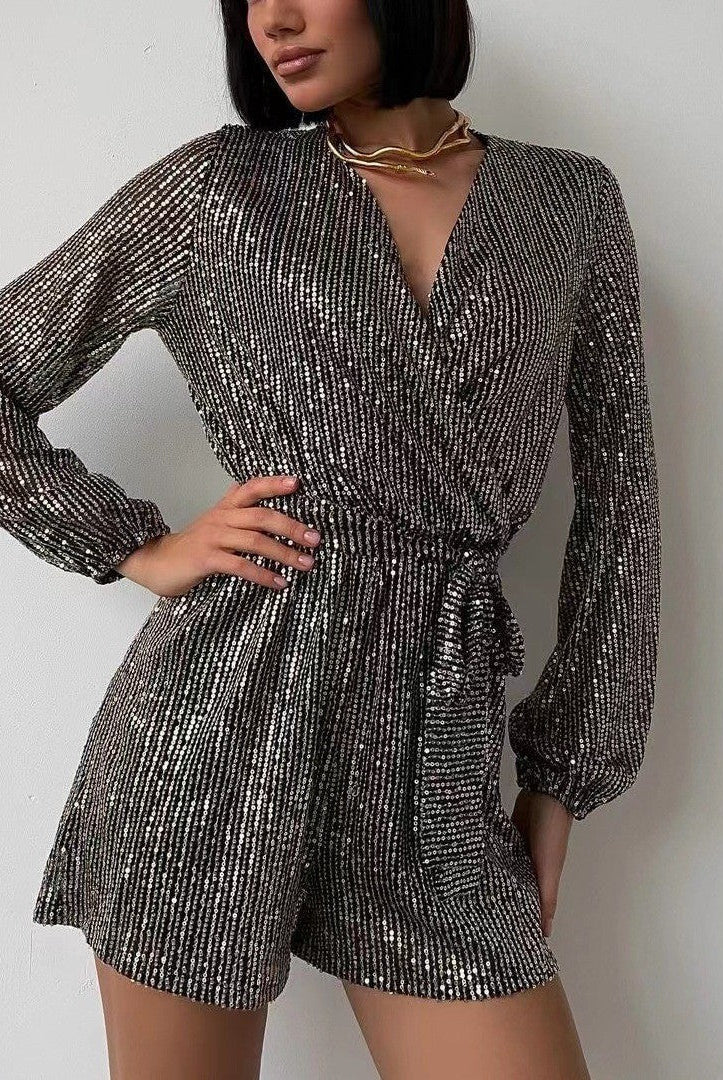 Lavinia silver sequin wrap mini dress with deep V-neck by Lumina Wear, featuring shimmering sequins and elegant fit.