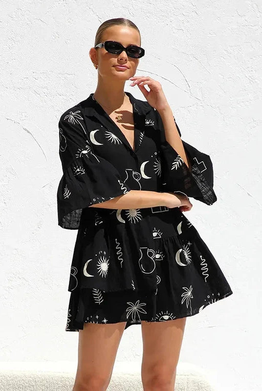 White Nova Lumina Vancouver mini shirt dress with deep V-neck collar, stylish and lightweight for casual or dressy occasions.