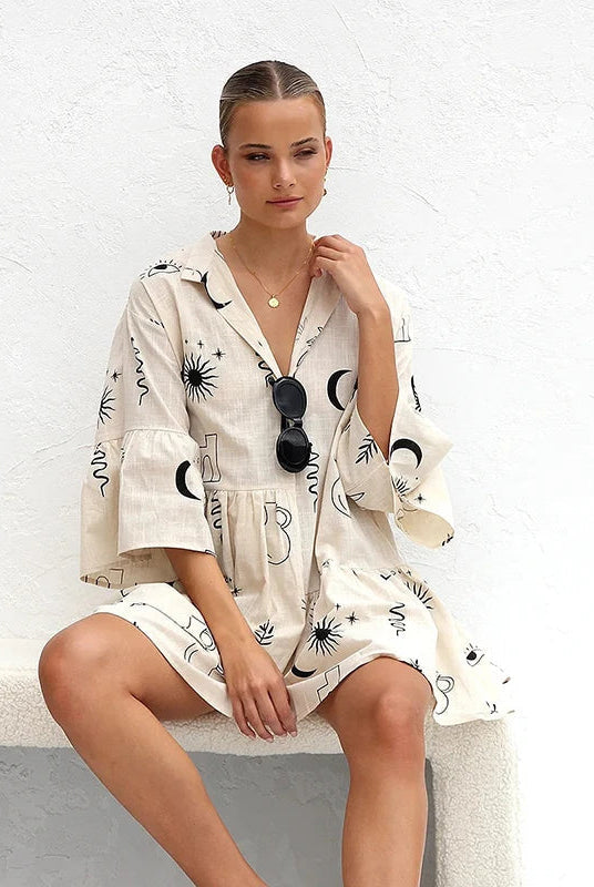 White Nova shirt dress with deep V-neck collar from Lumina Vancouver, styled as a chic mini dress.