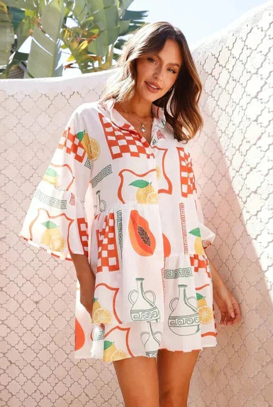 White Nova shirt dress by Lumina Vancouver with deep V-neck collar, mini length, stylish and casual for everyday wear.
