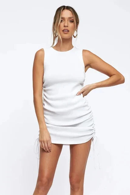 Black Nova sleeveless bodycon mini dress by Lumina Vancouver, form-fitting dress with a sleek silhouette and sleeveless design.