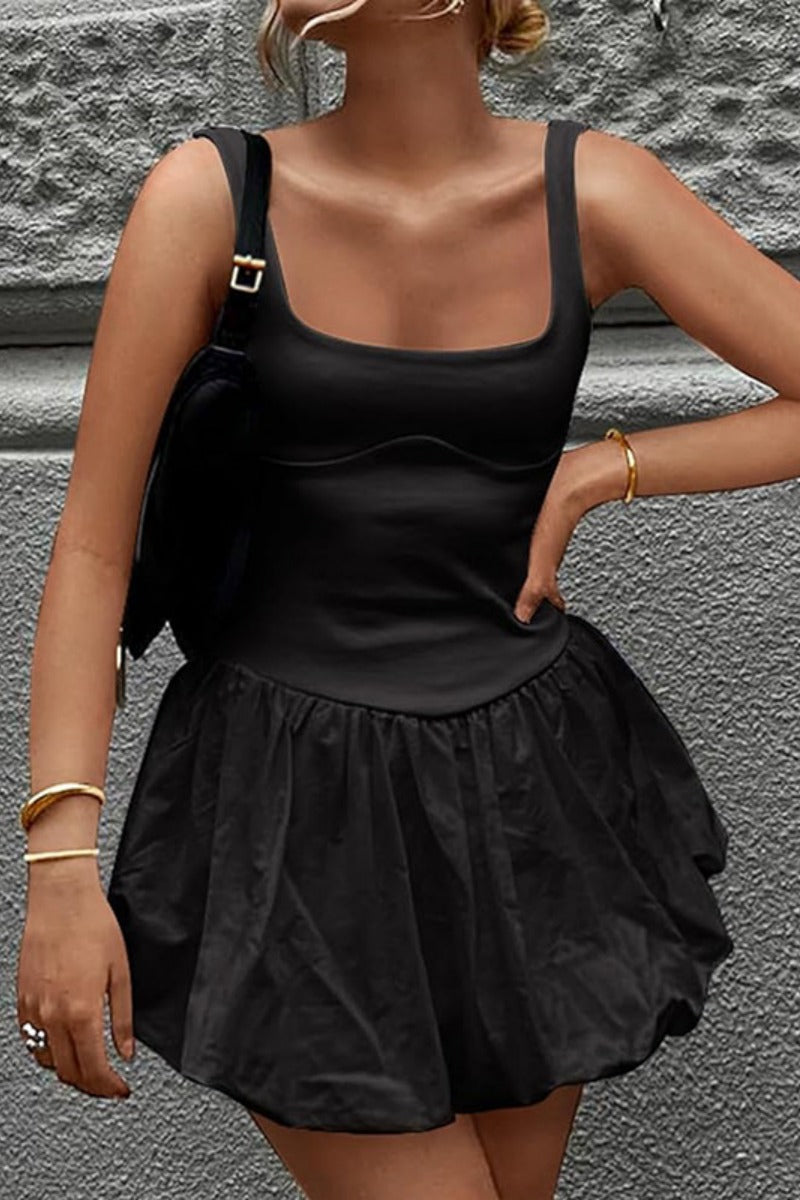 White Nova sleeveless bubble hem mini dress by Lumina Vancouver, featuring a stylish fit and playful design.
