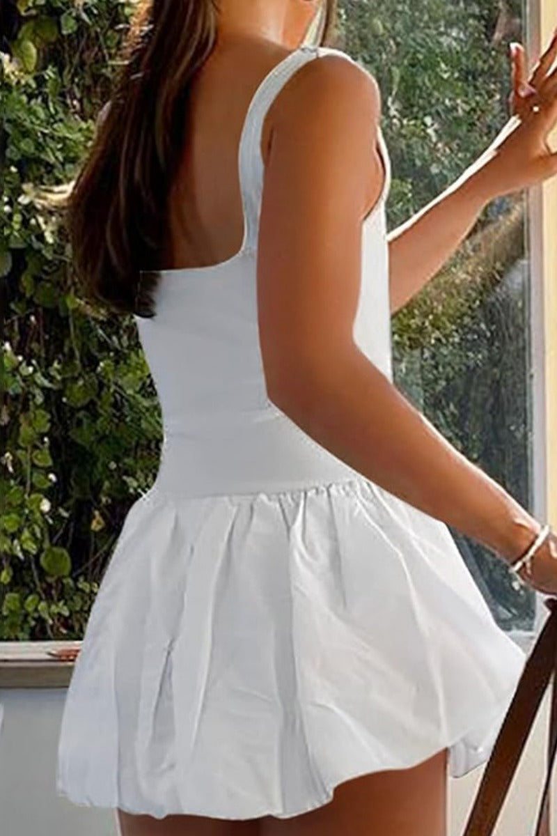 White Nova Lumina sleeveless bubble hem mini dress displayed on a hanger, showcasing its stylish design and fitted silhouette.