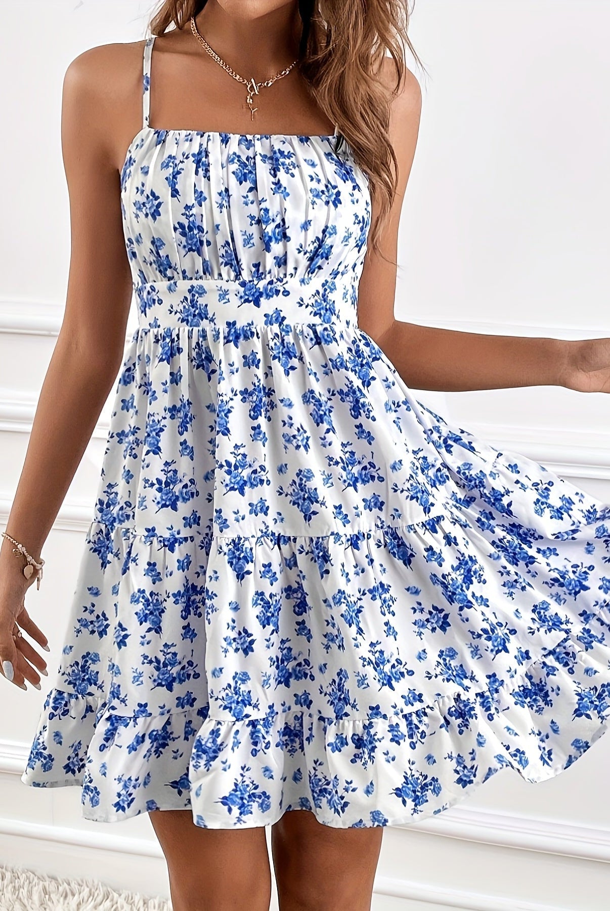 White floral print Nova sleeveless sundress by Lumina Vancouver, mini dress style, perfect for summer or casual wear.