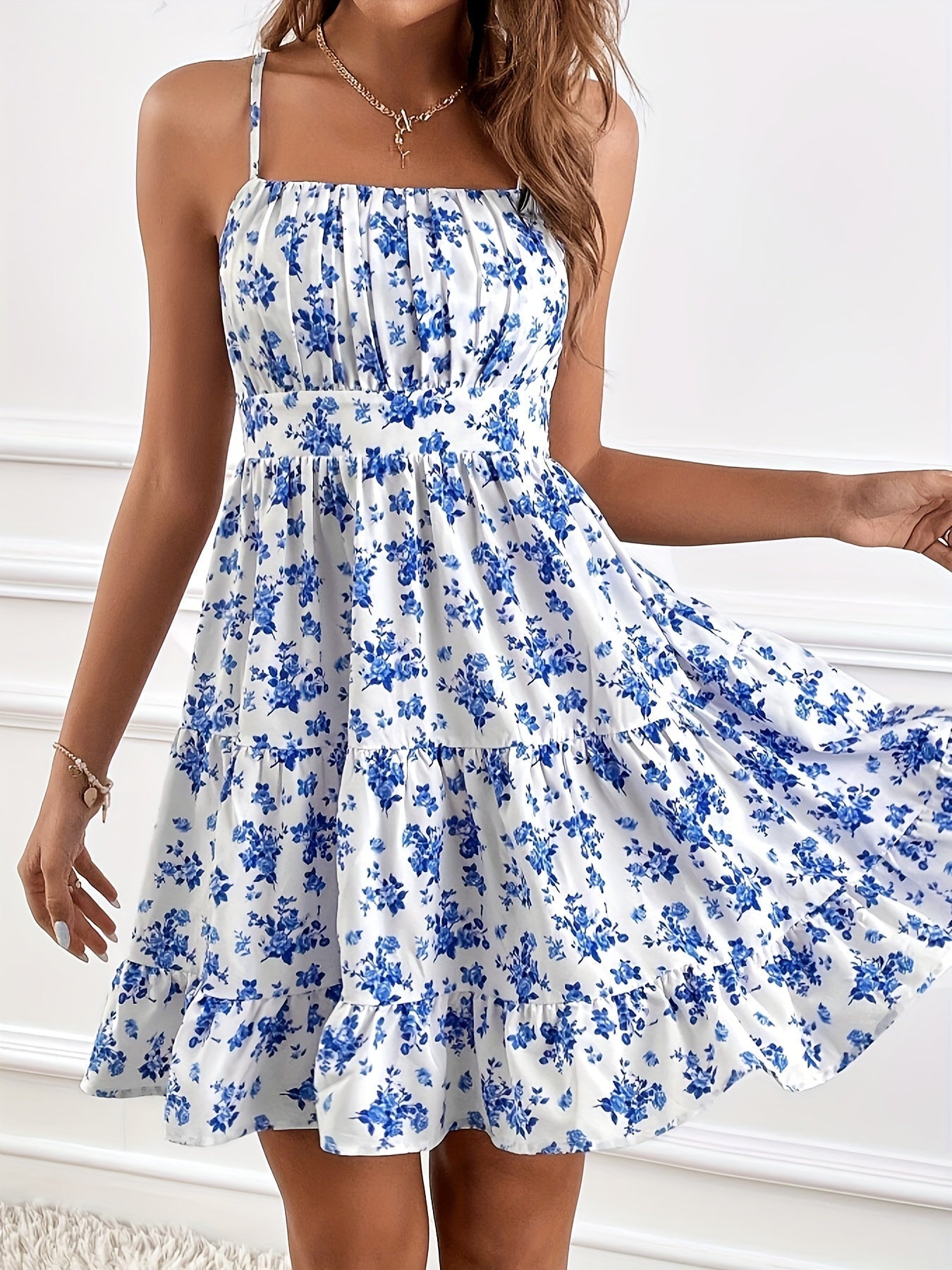 White floral print Nova sleeveless sundress by Lumina Vancouver, mini dress style, perfect for summer or casual wear.