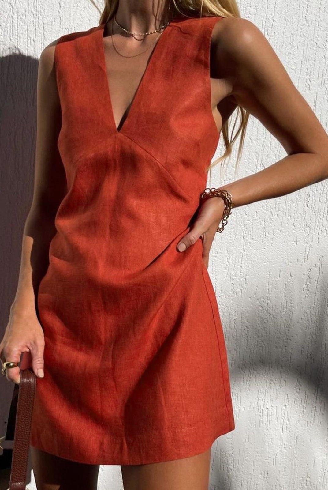 Red Sigrid linen-blend sleeveless V-neck mini dress by Lumina Wear, displayed on a model.
