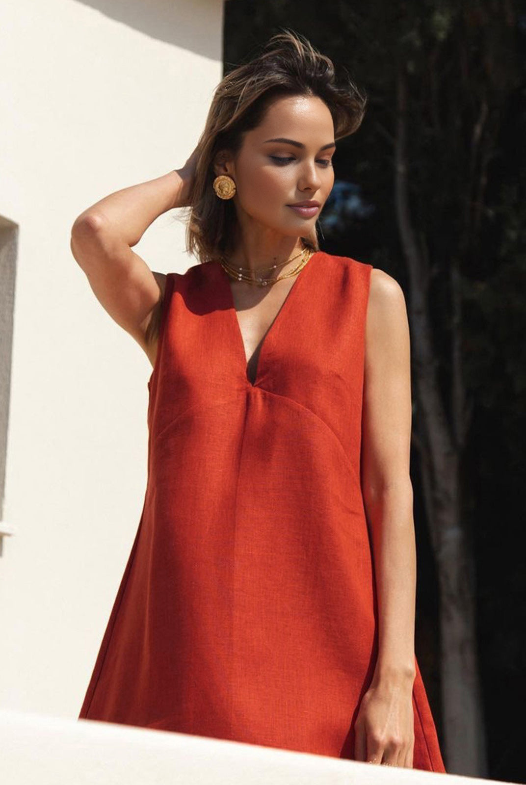 Red Linen-Blend Sleeveless V-Neck Mini Dress by Lumina Wear, shown on a model with a fitted silhouette and V-neck detail.
