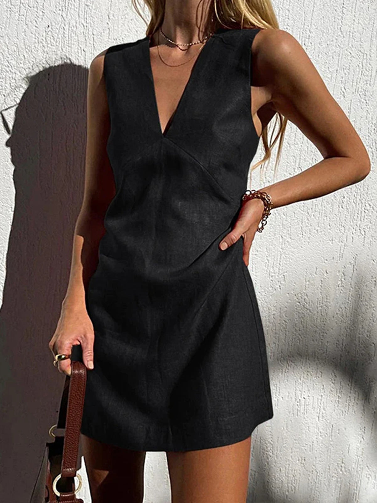 Red Sigrid Linen-Blend Sleeveless V-Neck Mini Dress by Lumina Vancouver, shown on a model, highlighting its stylish design.