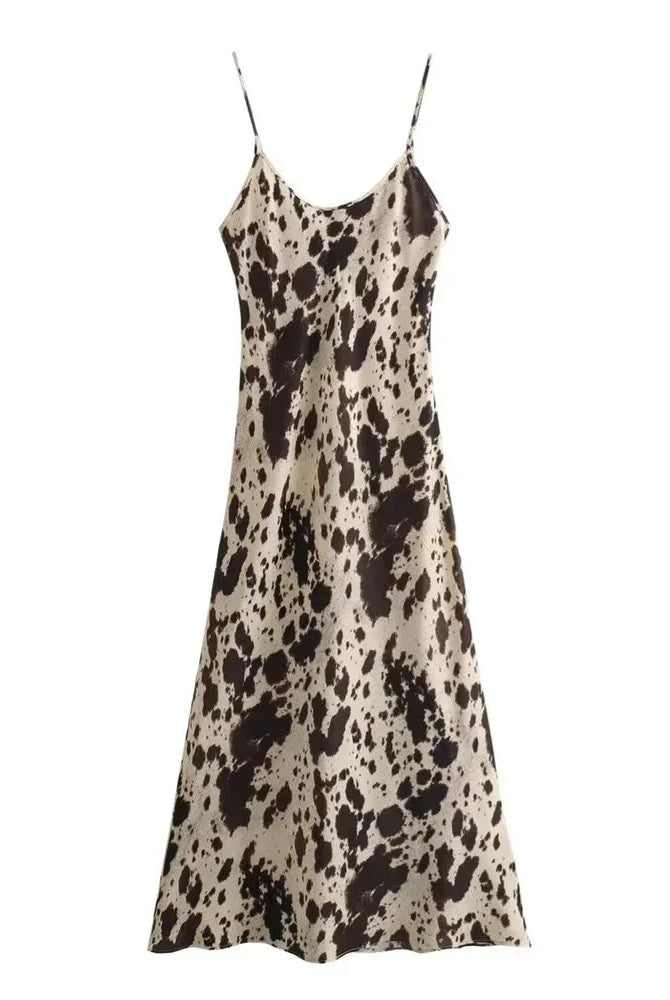 Beige Lumina Wear Aoife slip dress in silky satin with V-neck, mini length, shown on a model against a neutral background.