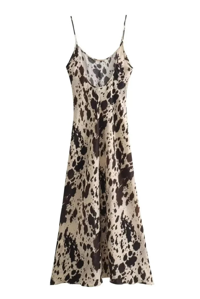 Beige silky satin Aoife slip dress by Lumina Wear featuring a V-neck and mini length, displayed on a hanger.