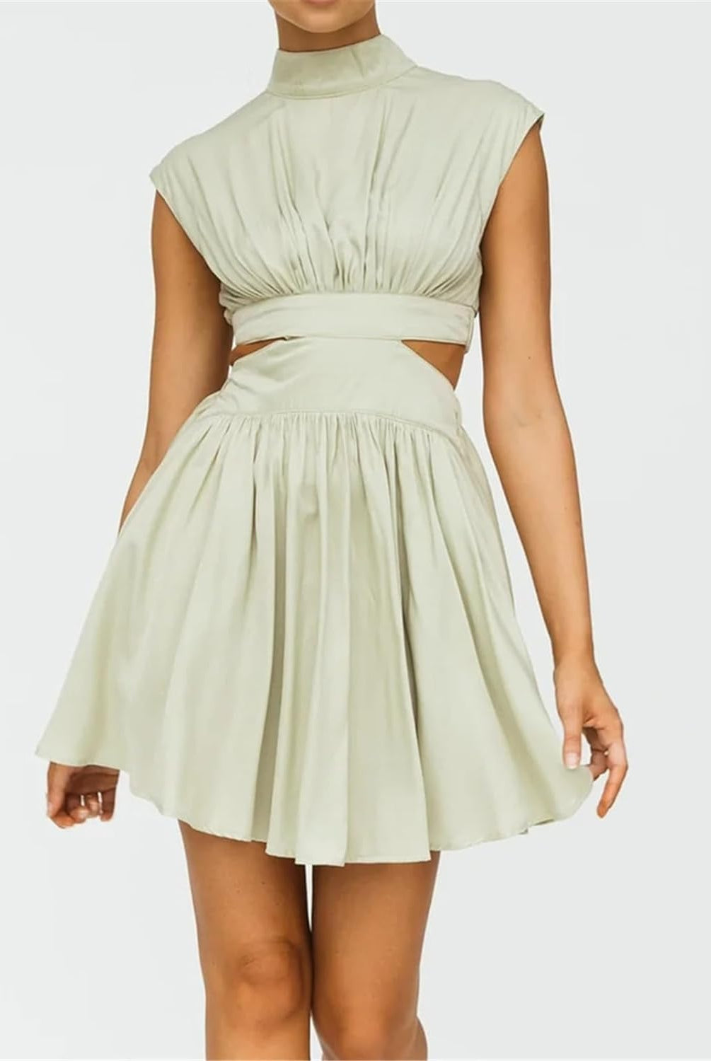 Black Nova two-piece sleeveless outfit by Lumina Vancouver, featuring a fitted mini dress with stylish design.