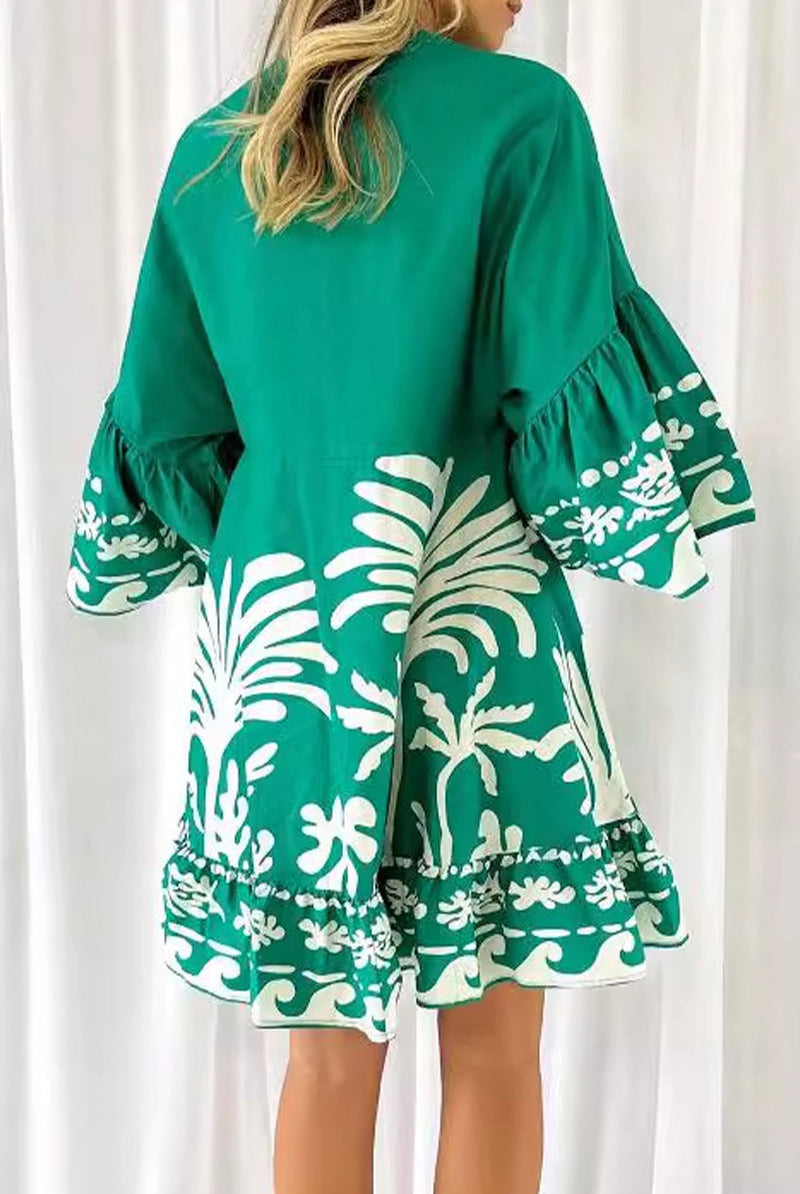 Lumina Vancouver Nova V-Neck A-Line Boho Print Mini Dress in green, featuring a relaxed fit and vibrant pattern.