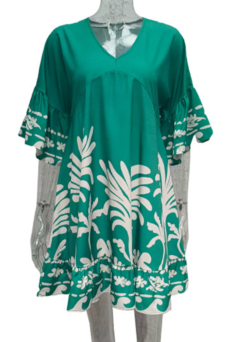 Lumina Vancouver Nova V-Neck A-Line Boho Print Mini Dress in green, featuring a stylish and flowy silhouette.