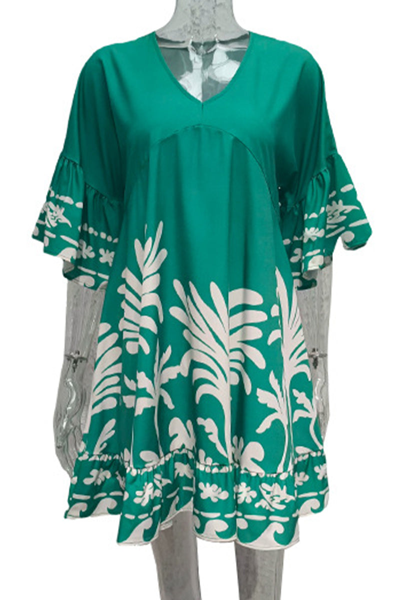 Lumina Vancouver Nova V-Neck A-Line Boho Print Mini Dress in green, featuring a stylish and flowy silhouette.