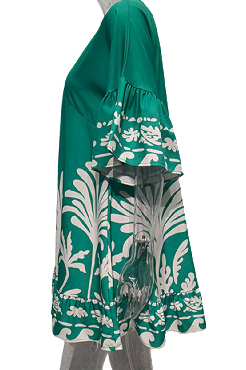 Green Nova V-Neck A-Line Boho Print Mini Dress by Lumina Vancouver, showing the flowing silhouette and vibrant pattern.