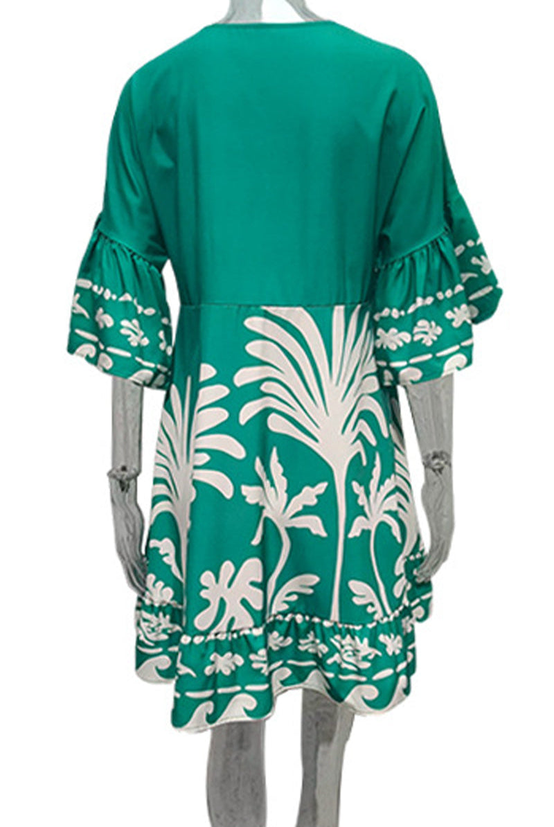 Green Nova V-Neck A-Line Boho Print Dress by Lumina Vancouver, mini length with flowing silhouette and vibrant bohemian pattern.