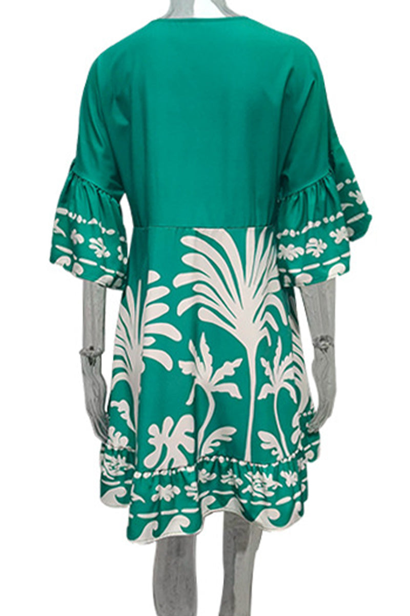 Green Nova V-Neck A-Line Boho Print Dress by Lumina Vancouver, mini length with flowing silhouette and vibrant bohemian pattern.