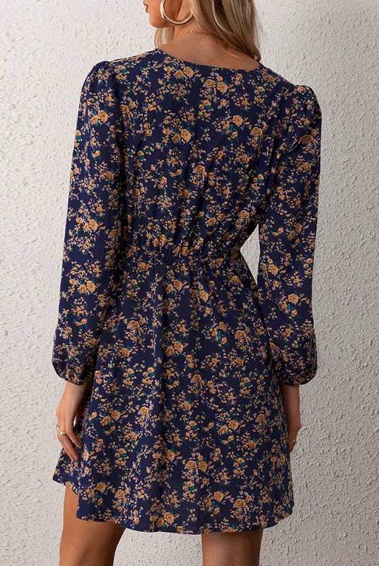Lumina Wear Bronwyn V-neck mini dress with floral print, featuring short sleeves and a fitted silhouette.