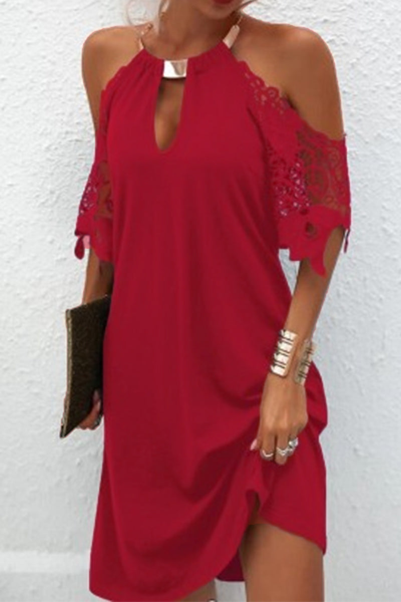 Black women's cold shoulder mini dress by Lumina Vancouver, featuring a stylish off-shoulder design and fitted silhouette.