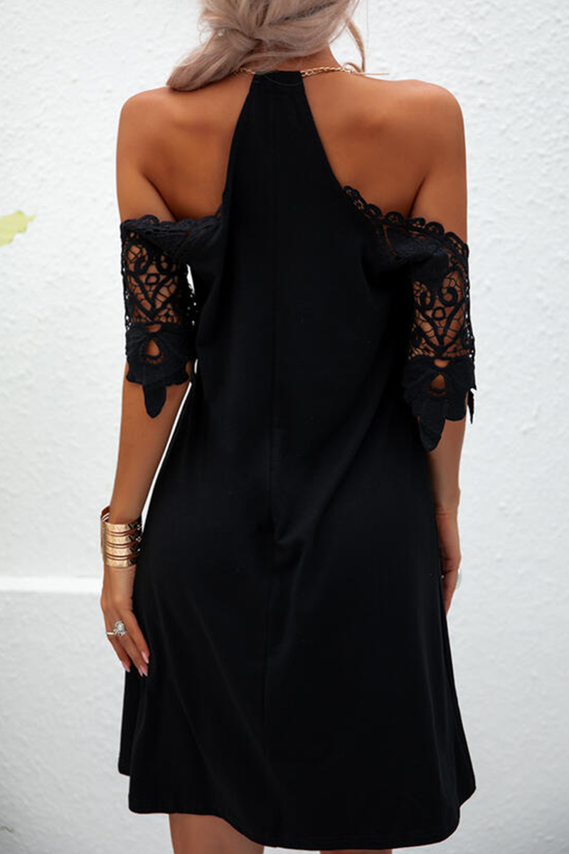 Black Nuala women's cold shoulder mini dress by Lumina Vancouver displayed on a model. Stylish, fitted dress with shoulder cut-outs.