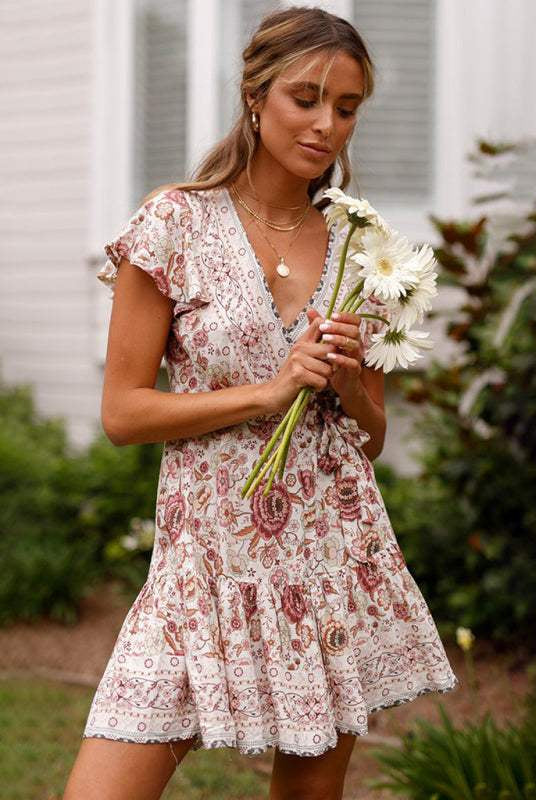 Lumina Wear Gwyn floral print wrap mini dress in blue, featuring a stylish design and lightweight fabric.