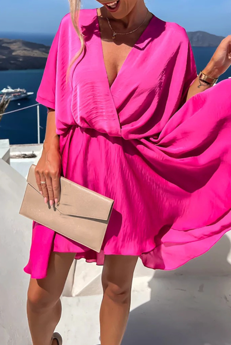 Pink Nova Wrap Dress by Lumina Wear featuring a V-neck, short sleeves, perfect for casual or semi-formal occasions.