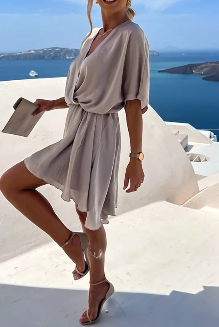 Pink Nova Wrap Dress by Lumina Wear, V-neck, short sleeves, mini length, casual elegant style, perfect for warm weather.
