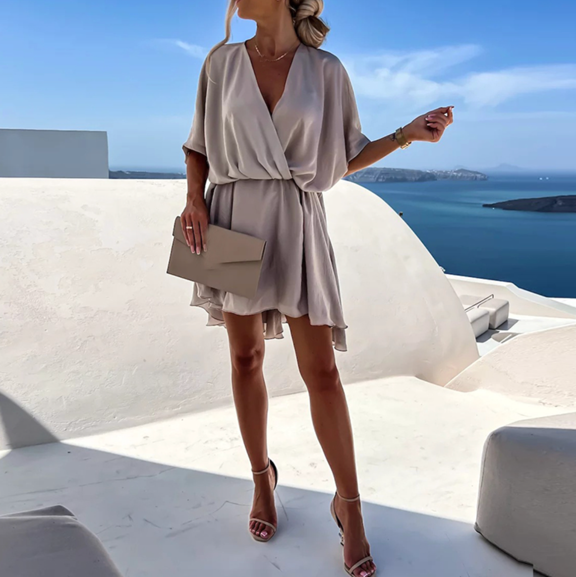 Pink Nova Wrap Dress by Lumina Wear with V-neck and short sleeves, stylish mini dress perfect for casual or semi-formal wear.