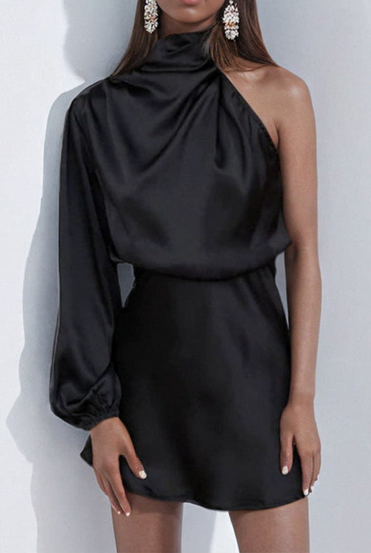 Black Novae mini dress by Lumina Wear featuring a one-shoulder satin design, sleeveless style, and fitted silhouette.