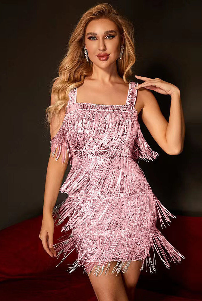 Gold sequin fringe mini dress by Lumina Wear, featuring a fitted bodycon style with shimmering details, perfect for evening wear.
