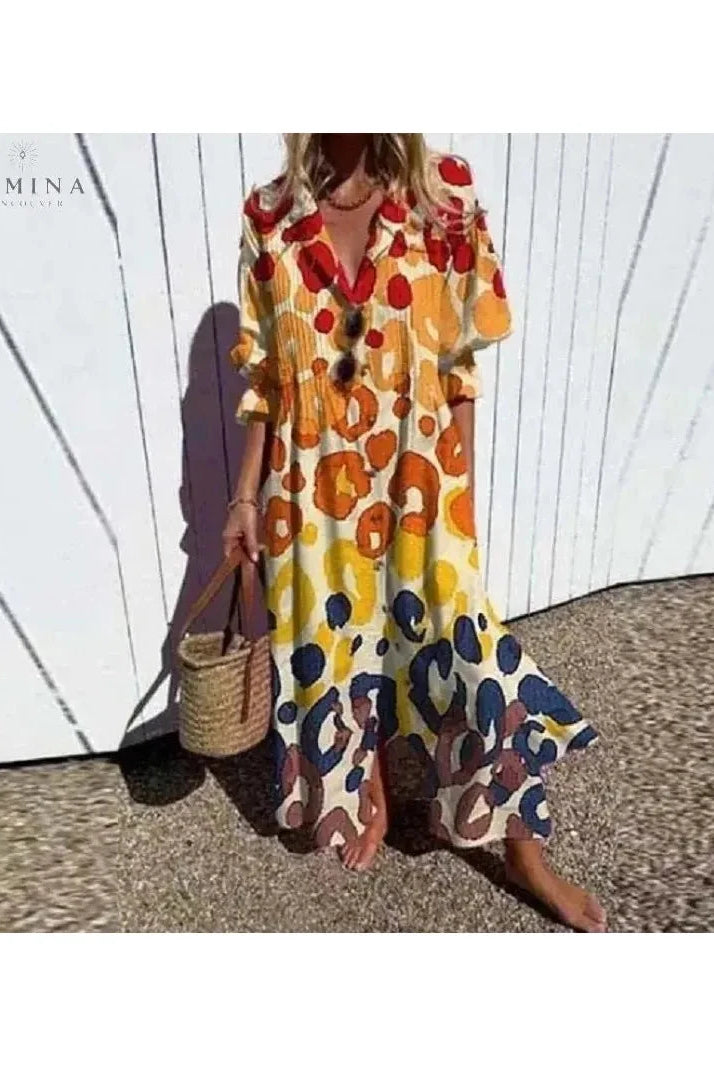 Multicolor Odessa elegant dress by Lumina Vancouver featuring flowing fabric and intricate patterns, perfect for formal occasions.