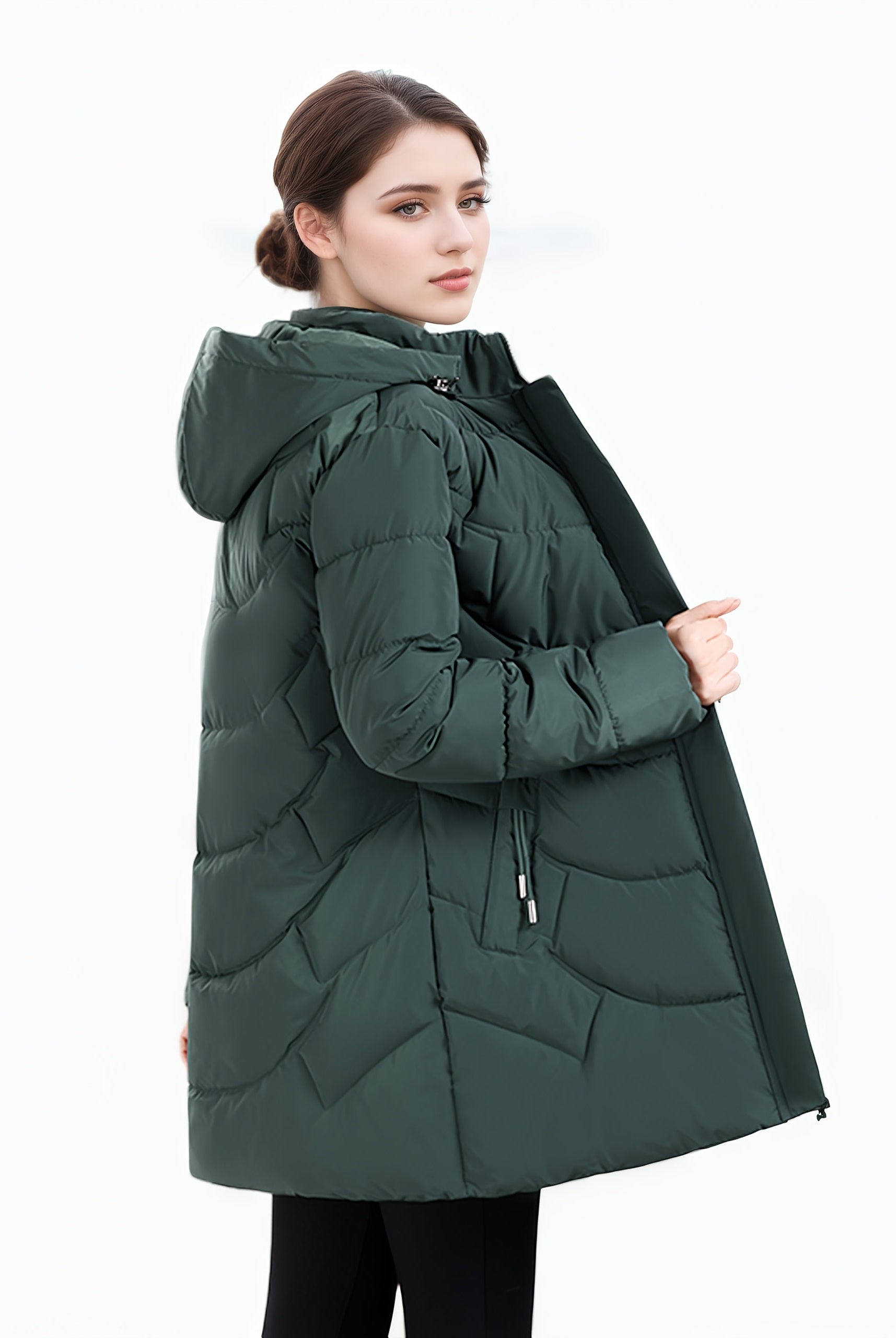 Dark green Olivia puffer coat by Lumina Wear featuring a longline hooded design and quilted pattern for women's winter outerwear.