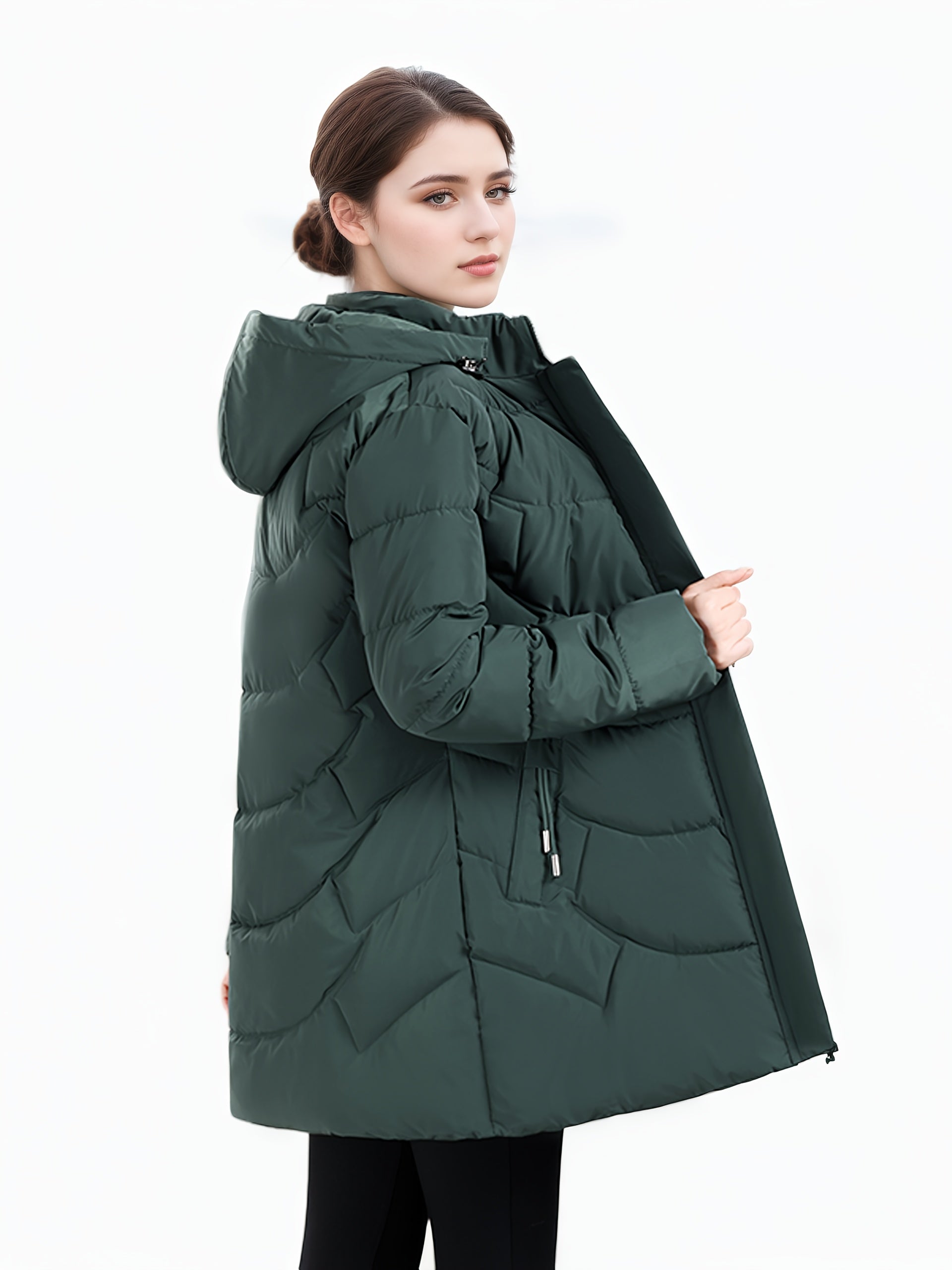 Dark green Olivia puffer coat by Lumina Wear featuring a longline hooded design and quilted pattern for women's winter outerwear.