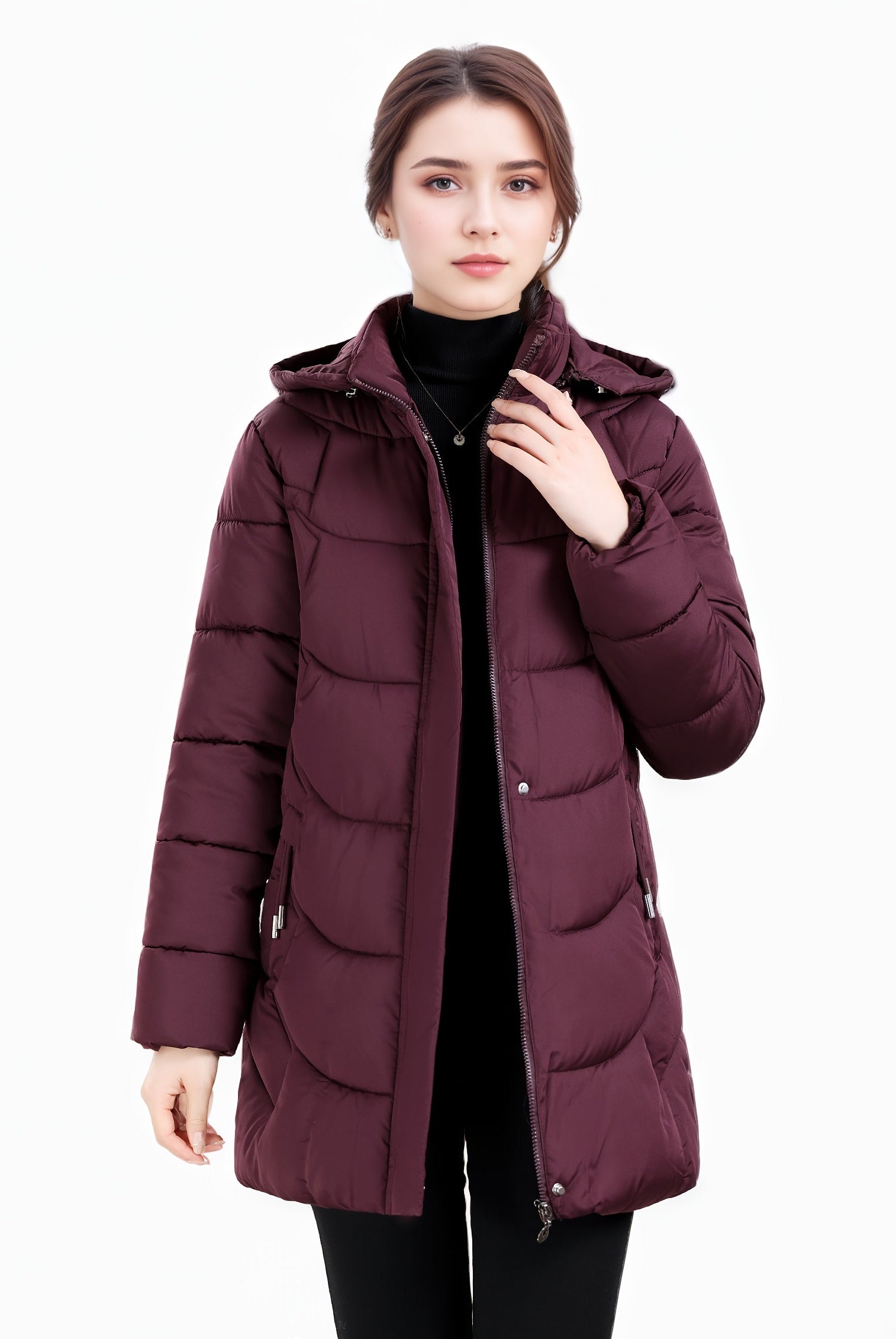 Dark green Olivia Lumina women's longline puffer coat with hood and quilted design, cozy and stylish winter outerwear.
