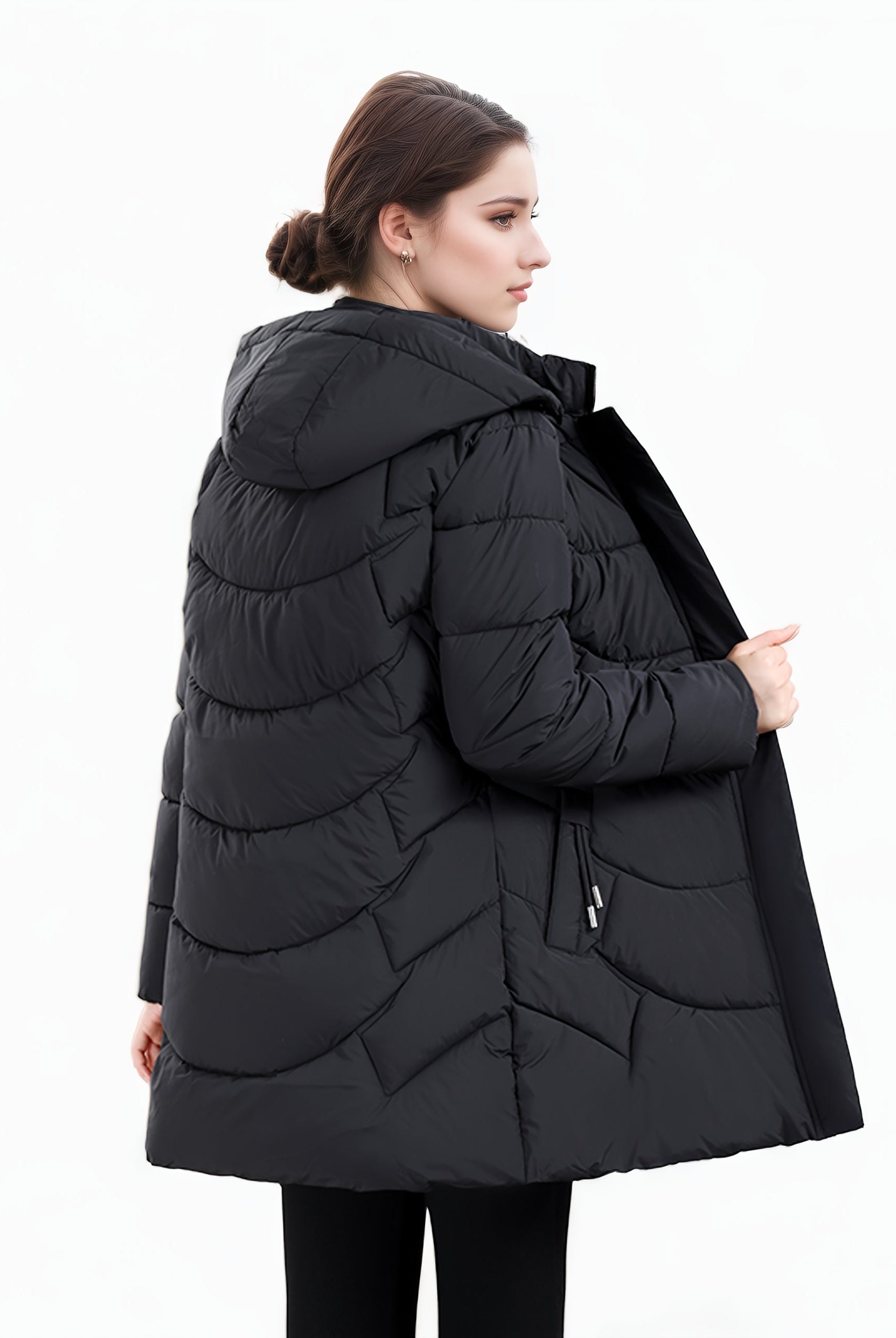Dark green Olivia Lumina women's longline hooded puffer coat with quilted design, cozy and stylish for cold weather.