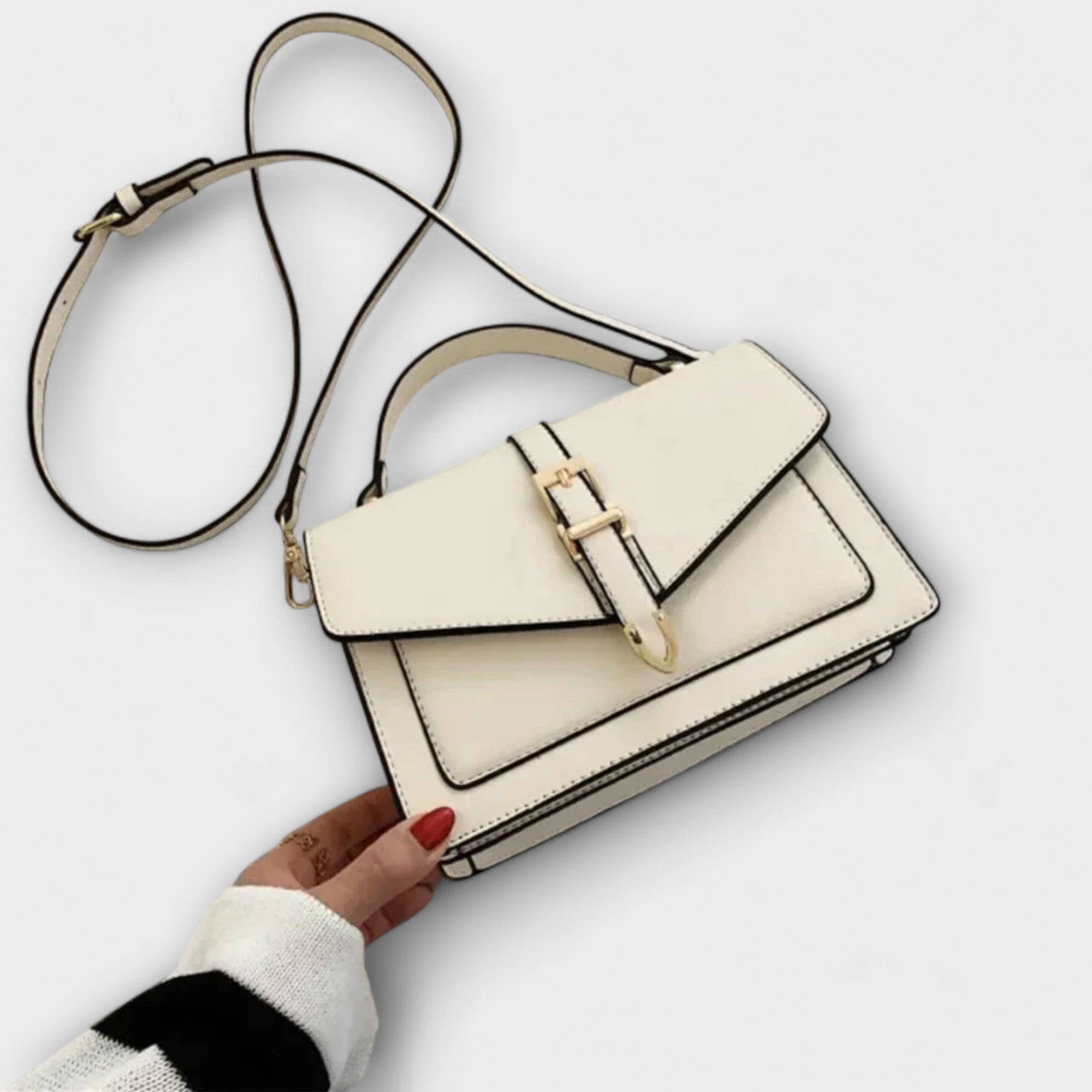 Lumina Wear Olivia mini satchel handbag in khaki with a timeless buckle detail, showcasing elegant design and compact size.