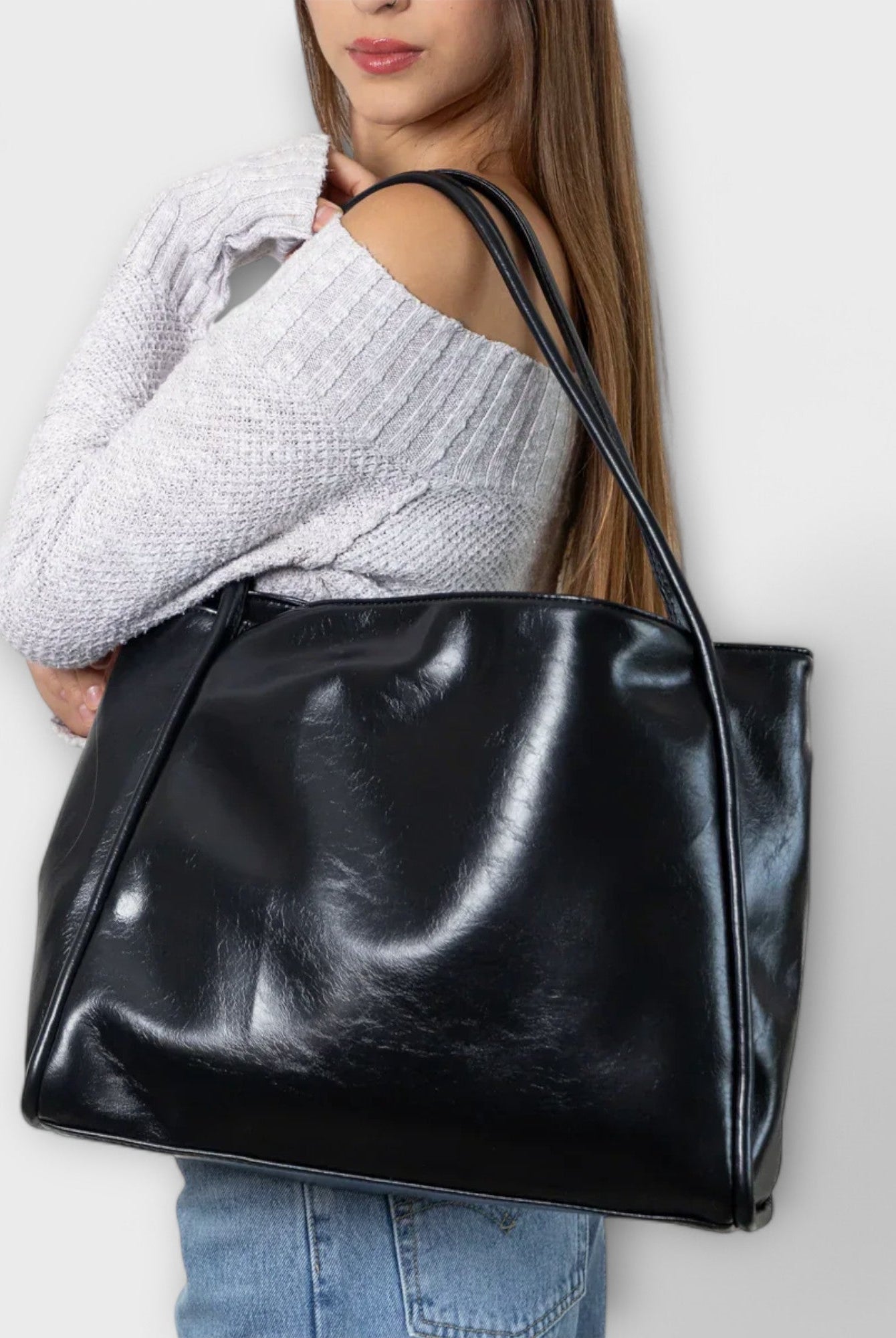 Black Olivia tote by Lumina Wear, a minimalist tote bag with a spacious design perfect for everyday use.