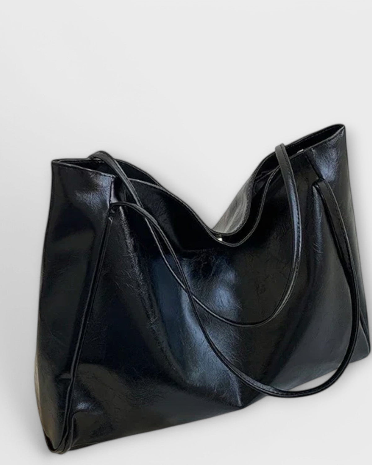 Black Lumina Wear Olivia tote handbag with a spacious, minimalist design perfect for everyday use.
