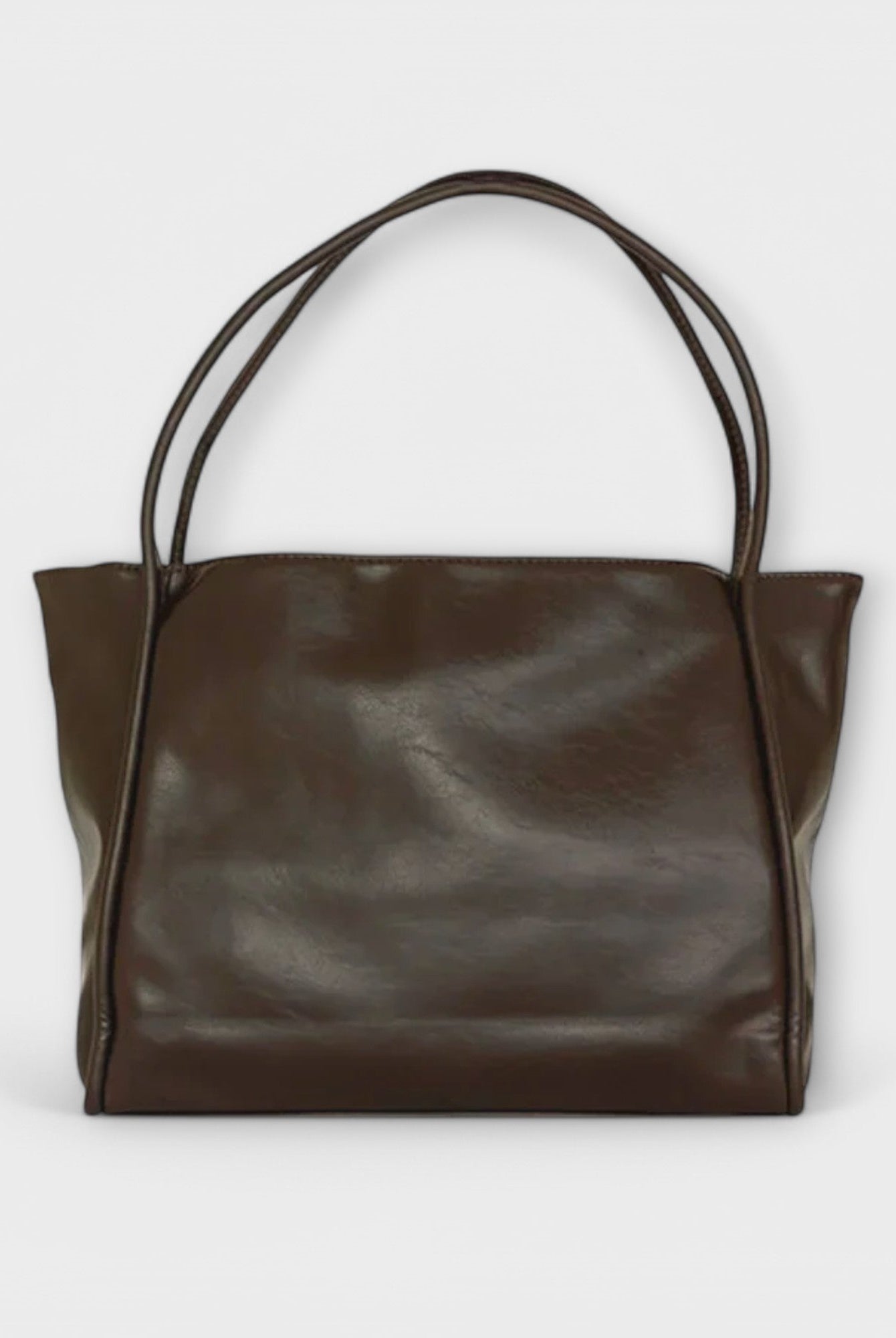Black Olivia tote bag by Lumina Wear, minimalist design with spacious interior, casual and versatile tote for daily use.