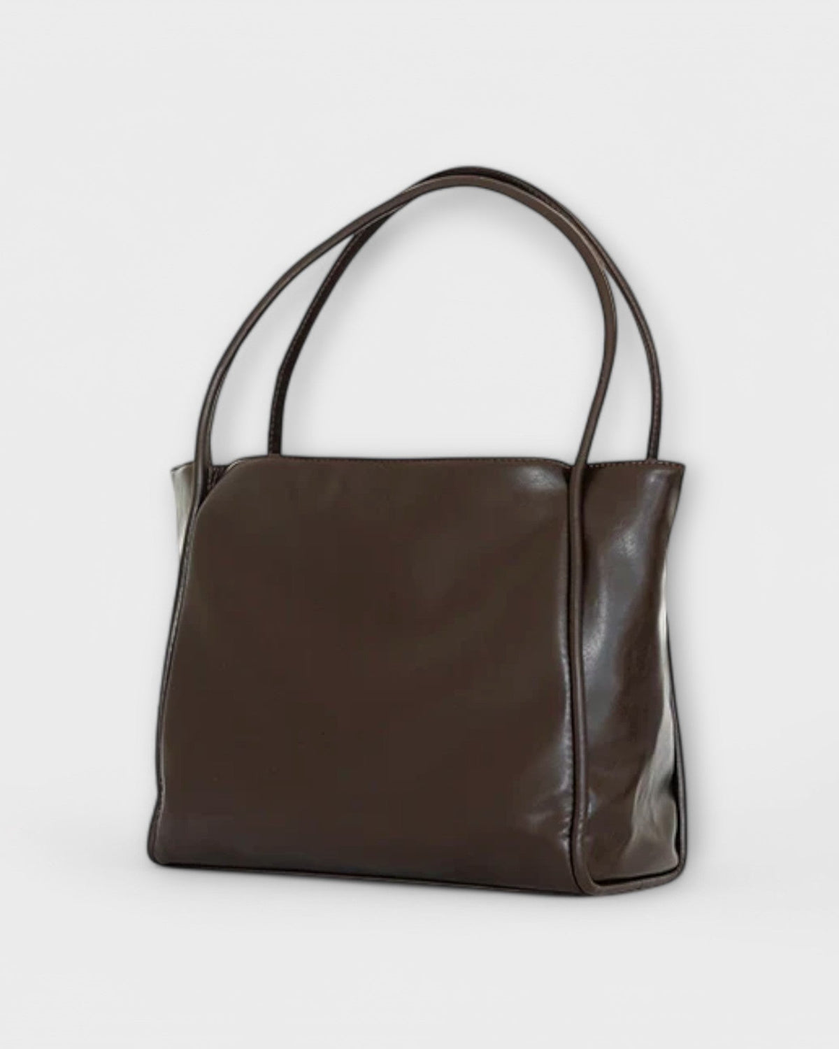 Black Lumina Wear Olivia tote handbag with a minimalist design and spacious interior for everyday use.