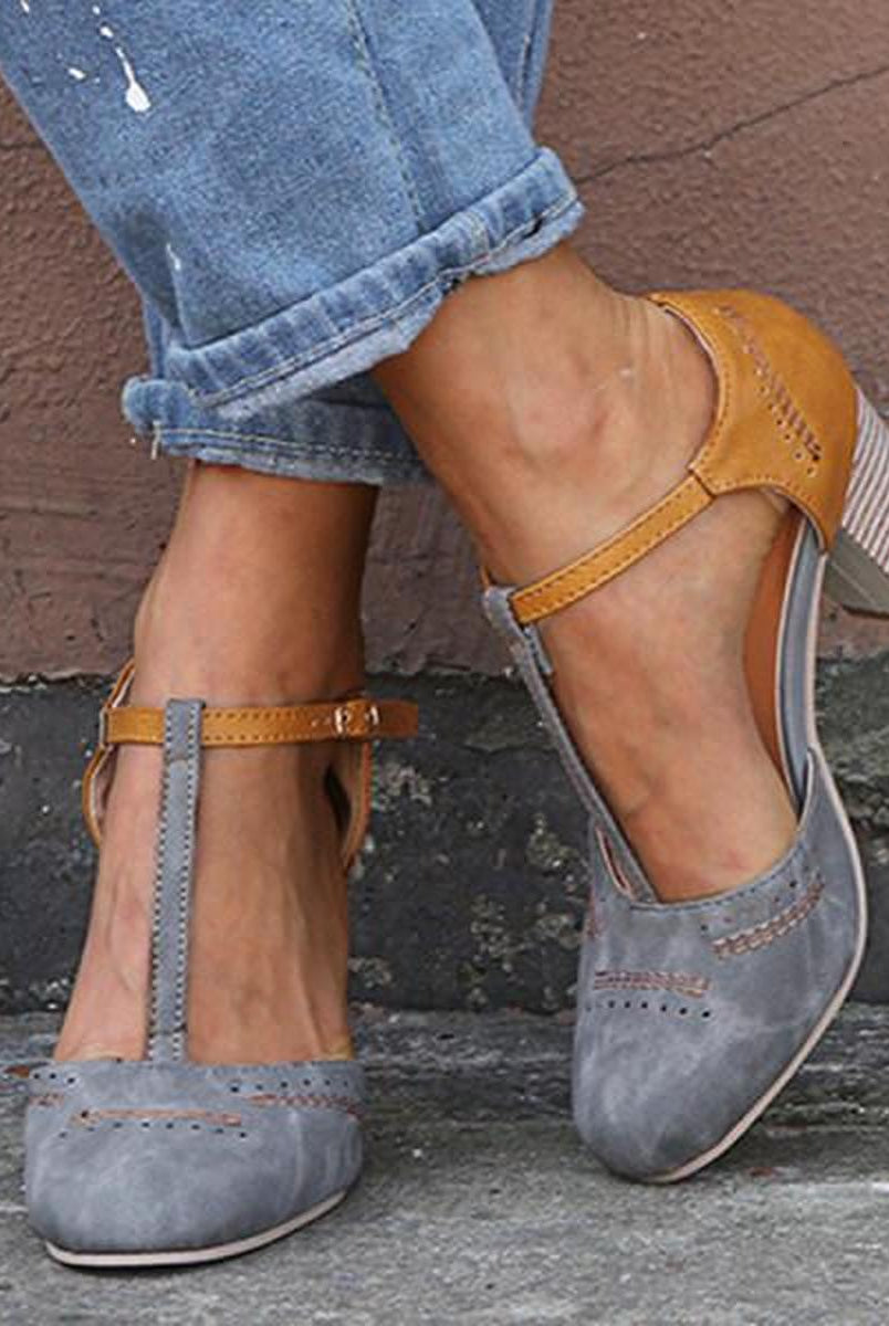 Olivia Lumina vintage-inspired blue ankle strap heels with block heel and secure fit, featuring stylish ankle straps.