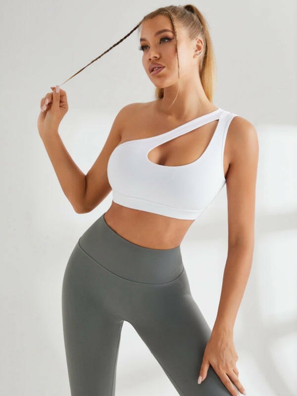 Lumina Vancouver one-shoulder sports bra in white with black and blue accents, designed for athletic support and style.