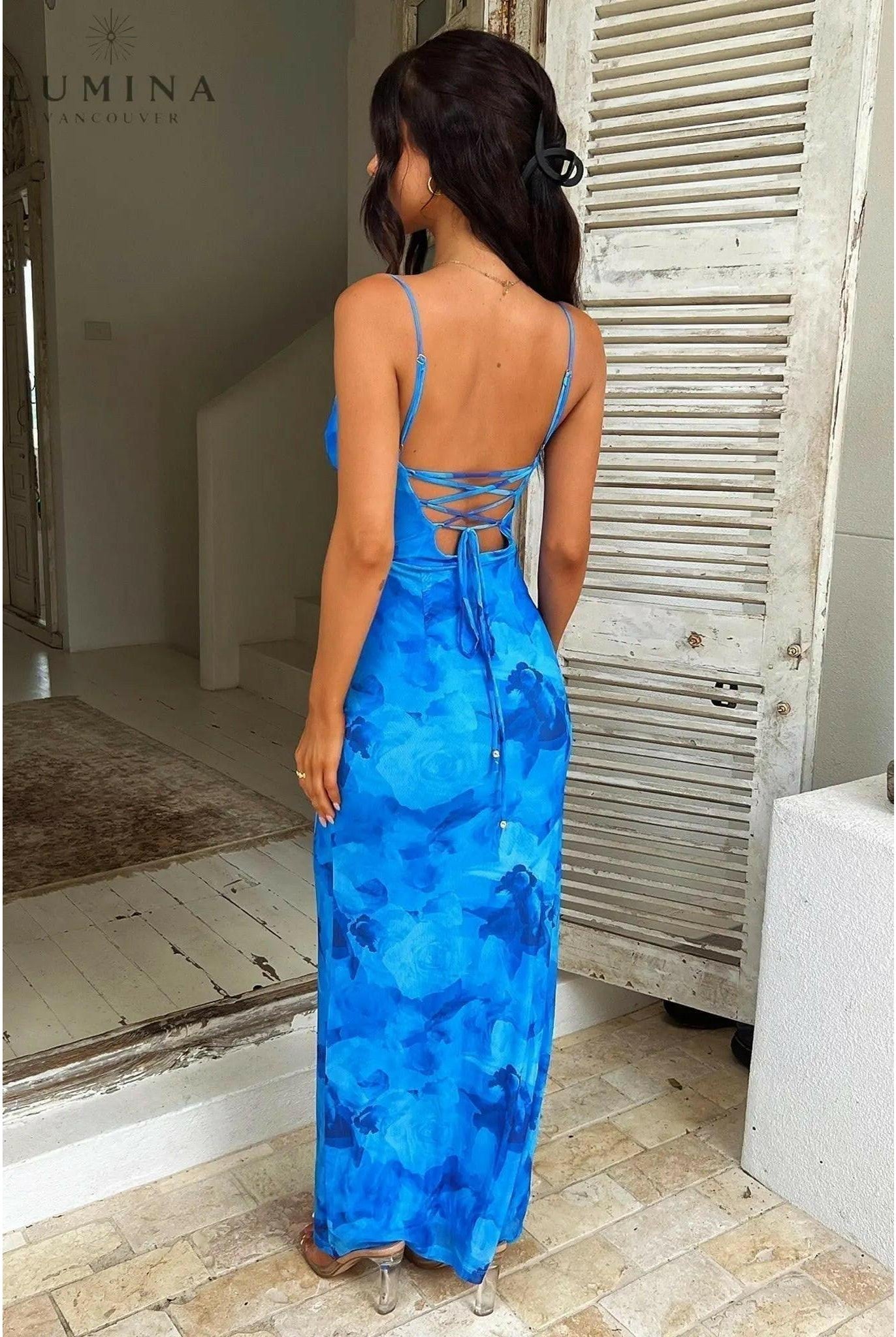 Opal Blue satin knot evening dress by Lumina Wear, featuring elegant design and fitted silhouette for wedding guest or formal events.