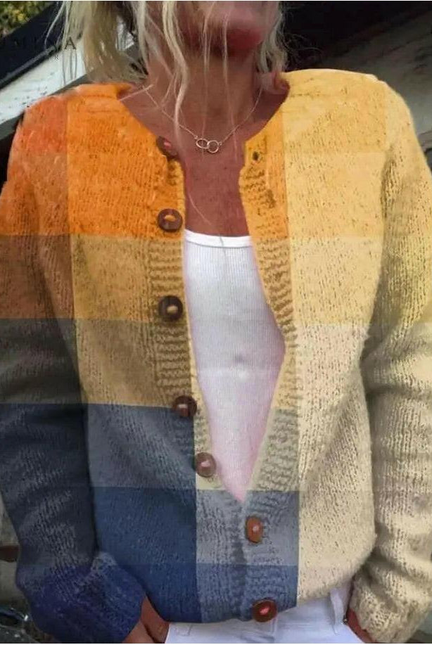 Orla Lumina Wear geometric print cardigan in size S, featuring colorful geometric patterns and a cozy knit texture.