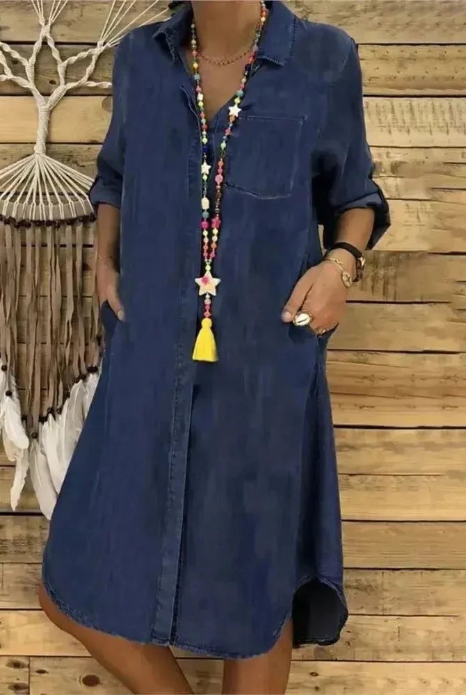 Baby blue Palmira denim long-sleeved dress by Lumina Wear, showcasing a stylish, casual look with fitted design and button details.